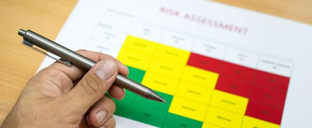 Standardized SCD and ASD test on a page with a hand holding a pen. 
